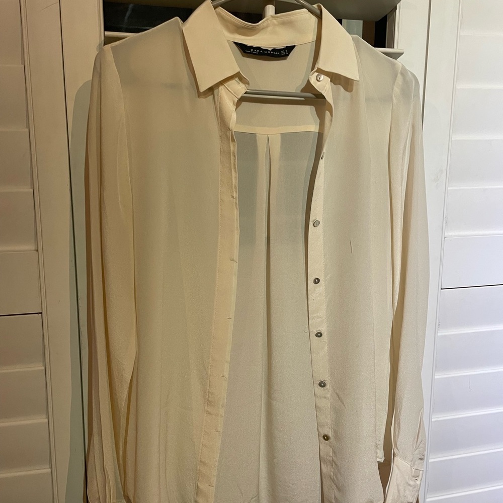 Dry cleaned, silk blouse.